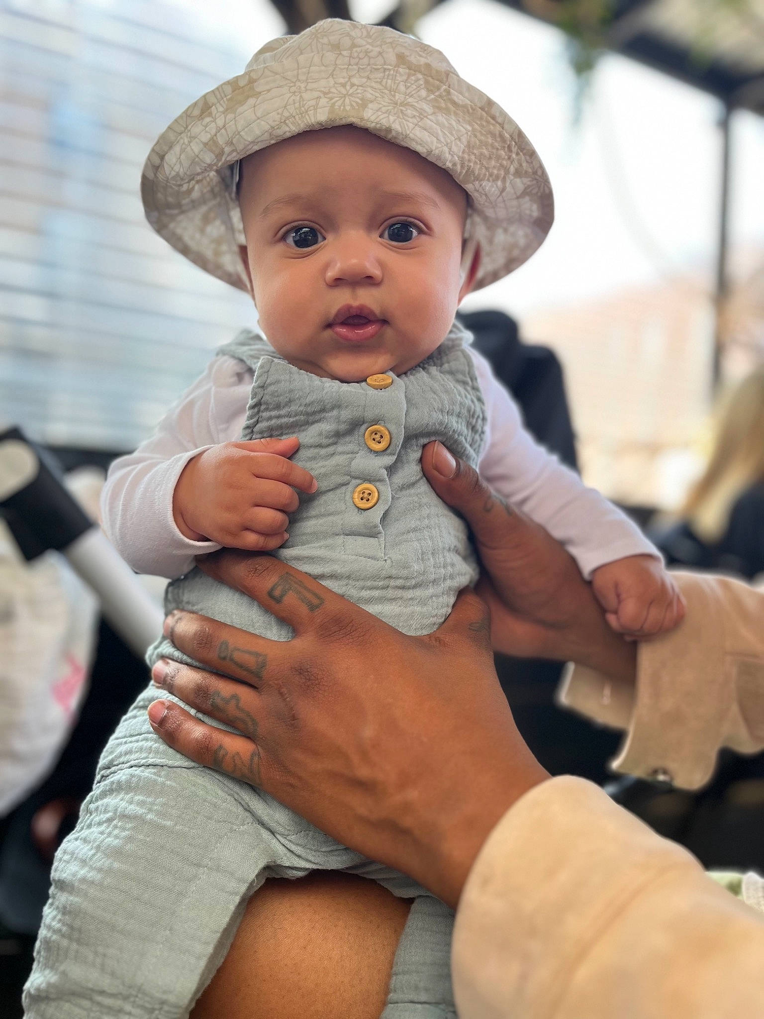 Ever joined the competition — help win amazing prizes! baby, baby_toddler_clothing, cap, child, fashion_accessory, fun, gesture, hand, happy, hat, headwear, human, lip, people, person, sitting, skin, sleeve, sun_hat, toddler