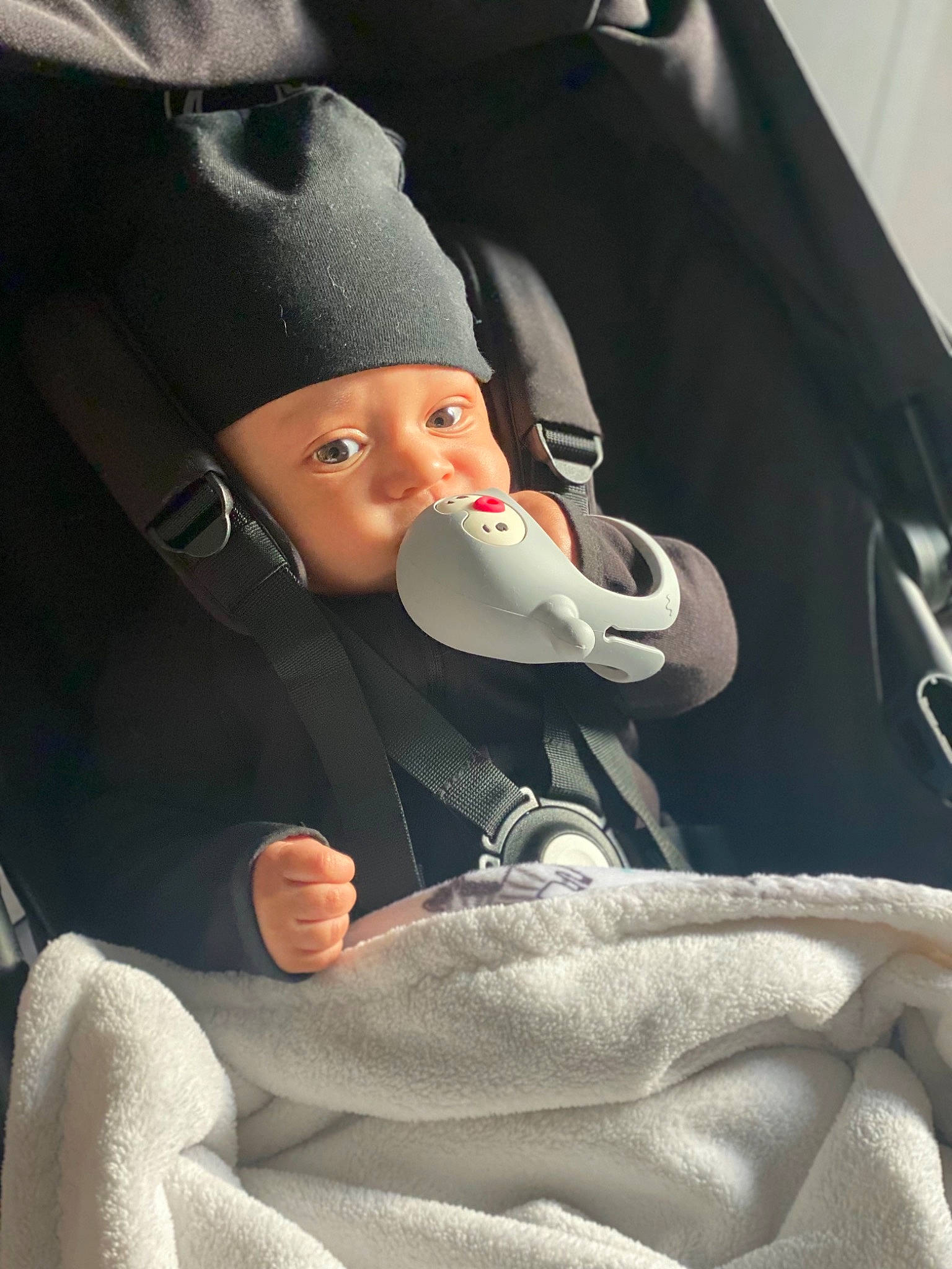Ever is registered to the contest to win money with this photo: auto_part, automotive_design, baby, baby_products, car_seat, carmine, child, comfort, driving, formal_wear, gesture, hat, head_restraint, headwear, helmet, luxury_vehicle, person, seat_belt, sitting, steering_wheel