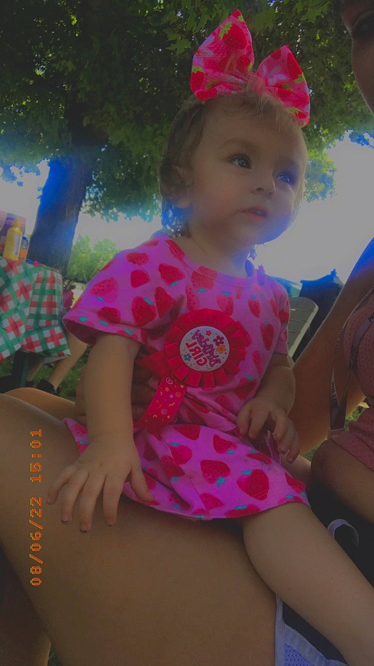 Annalee joined the competition — help win amazing prizes! baby_toddler_clothing, child, cool, face, facial_expression, fun, grass, hairstyle, happy, head, human_body, leisure, lip, magenta, organ, person, pink, public_space, skin, thigh