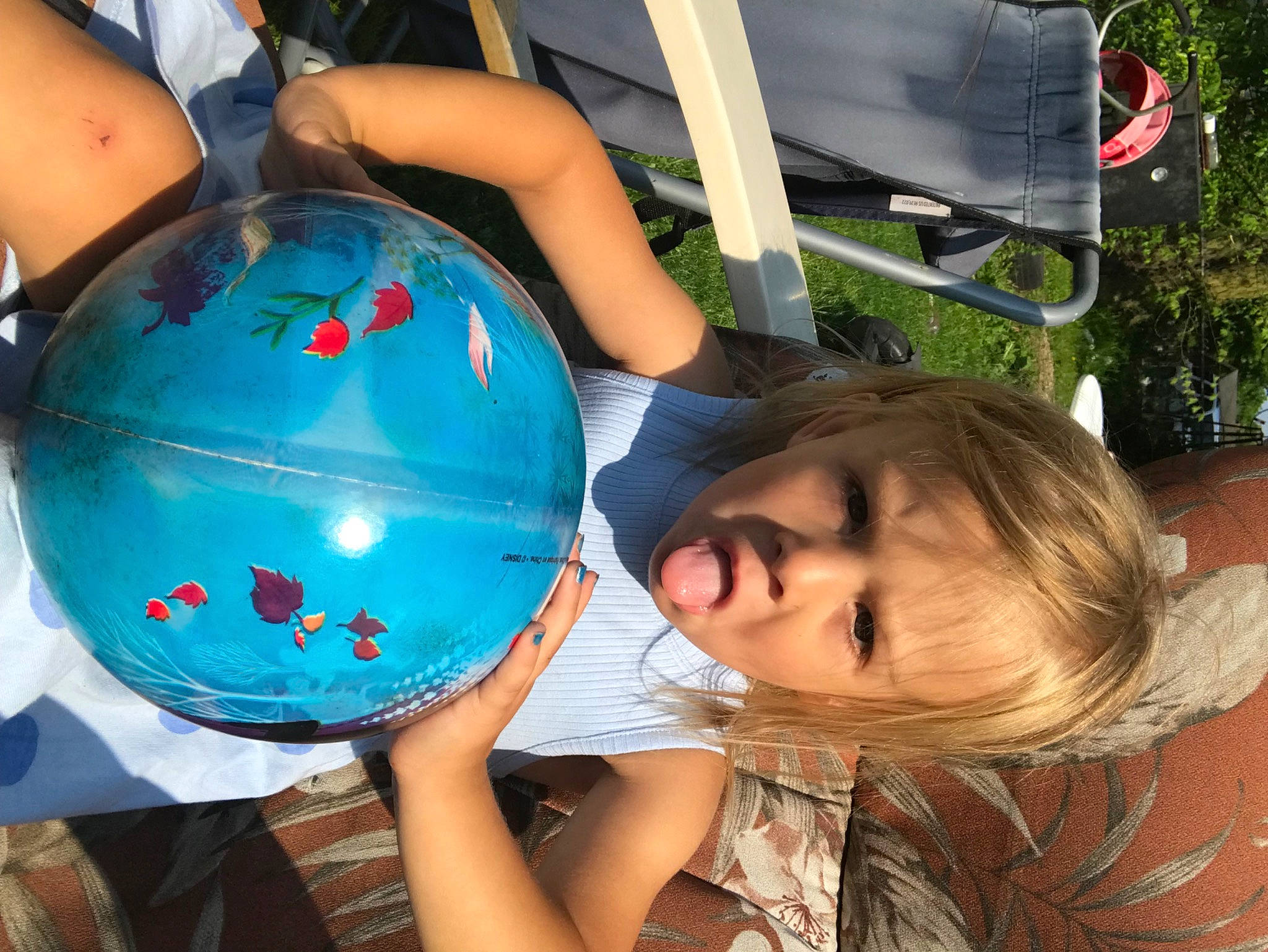 Paisley joined the competition — help win amazing prizes! balloon, chair, child, electric_blue, event, fun, globe, happy, leisure, party_supply, person, personal_protective_equipment, plant, play, recreation, t_shirt, toddler, toy, tree, vacation
