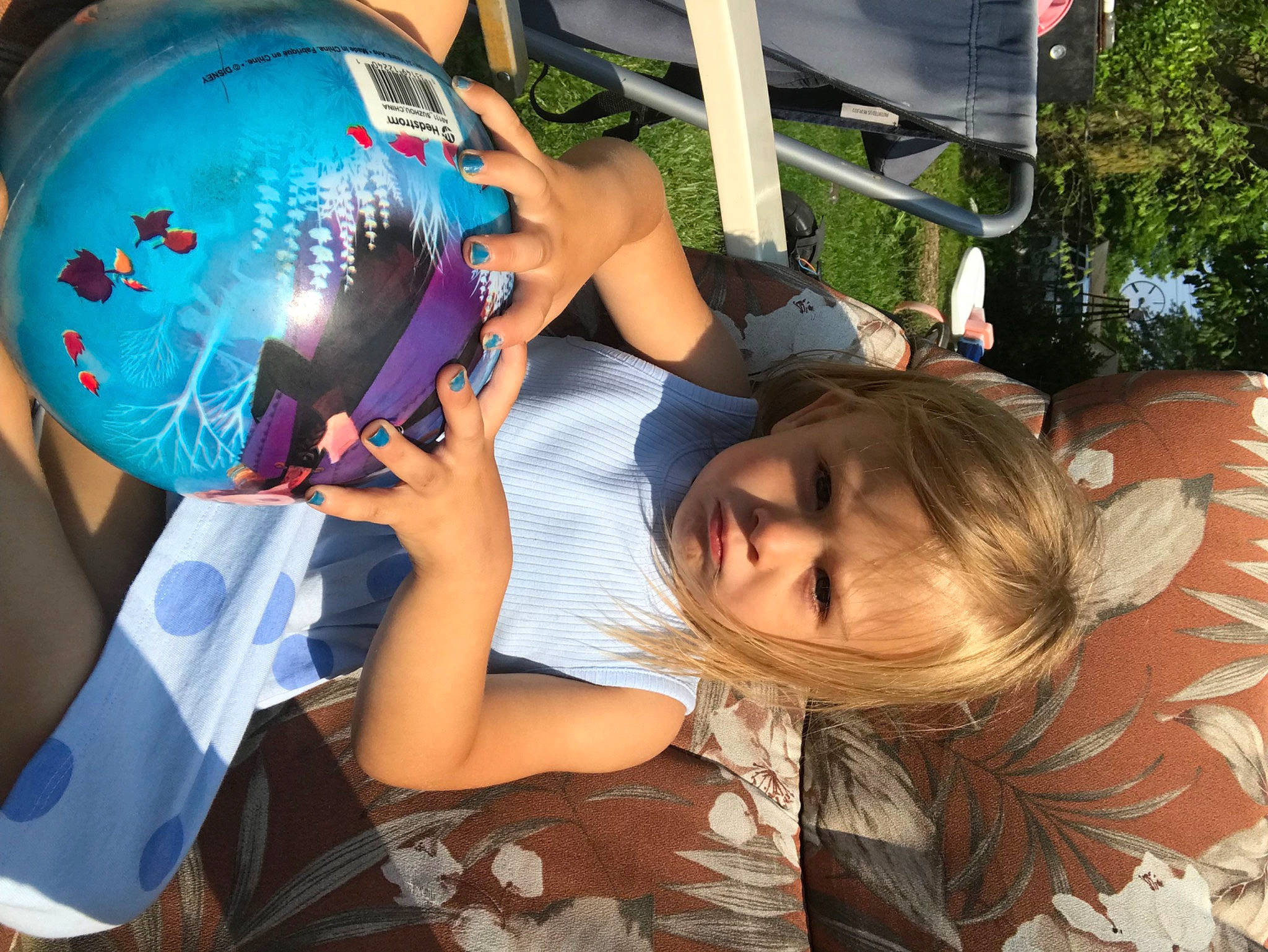 Paisley is registered to the contest to win money with this photo: balloon, child, electric_blue, event, fun, globe, happy, leisure, musical_instrument, party, party_supply, person, play, recreation, sorrow, t_shirt, toddler, toy, tree, vacation