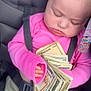 Rain joined the competition — help win amazing prizes! baby, child, sleeping, car_seat, money, dollar_bills, pink_shirt, green_shorts, straps, cute, infant, cash, hand, face, closed_eyes, hair_tie, sitting, seatbelt, young, portrait