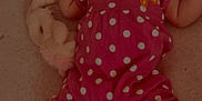 Rain is registered to the contest to win money with this photo: baby, infant, pink_outfit, polka_dot, butterfly_patch, sunglasses, flower_shaped, pigtails, black_sneakers, converse, plush_toy, cuddly_toy, soft_surface, cute, child, lying_down, indoors, fashion, footwear, accessories