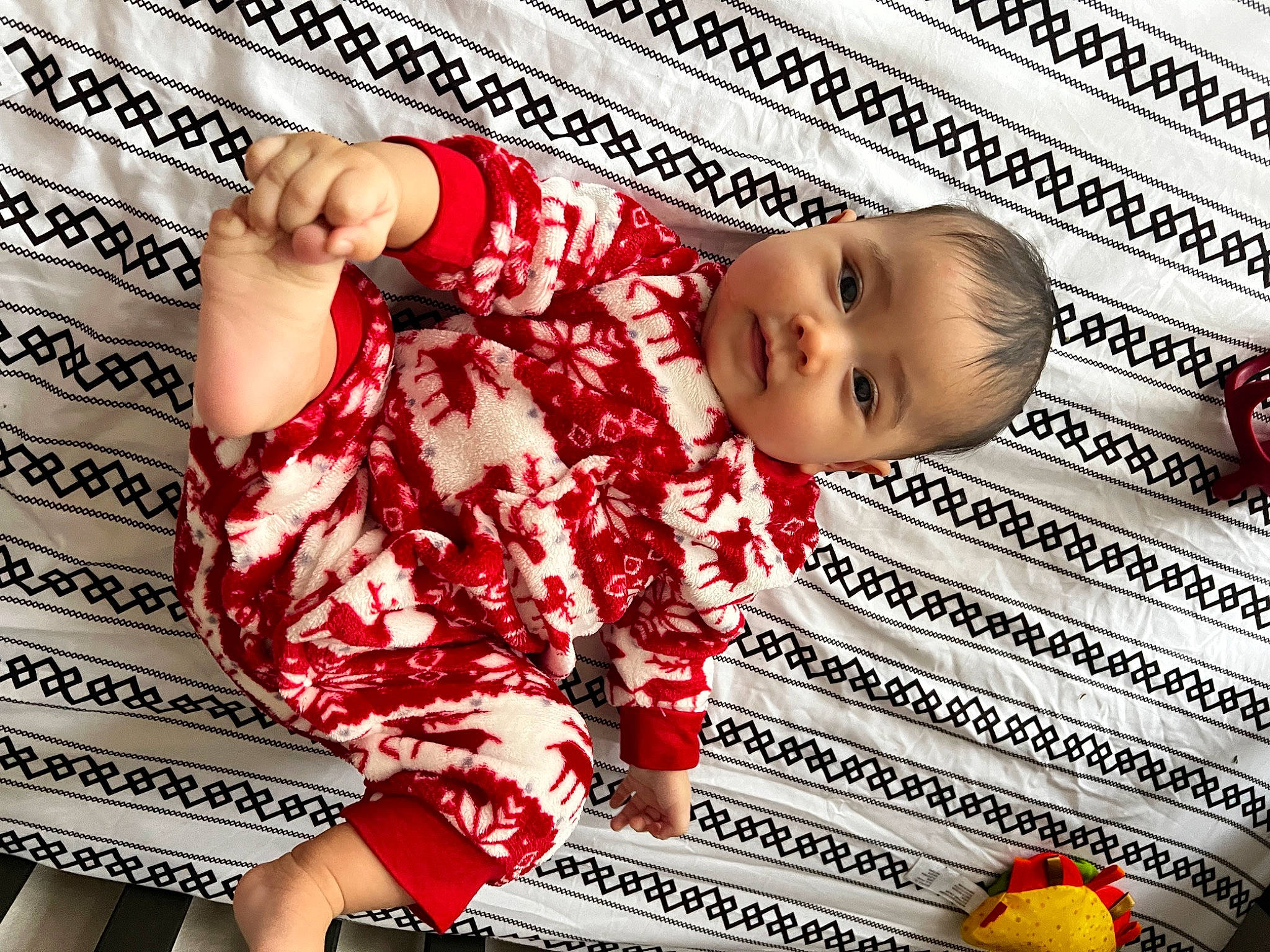 Althea is registered to the contest to win money with this photo: baby, baby_toddler_clothing, beauty, child, comfort, flooring, fun, gesture, happy, human_leg, pattern, person, product, red, sleeve, snapshot, t_shirt, textile, thigh, thumb