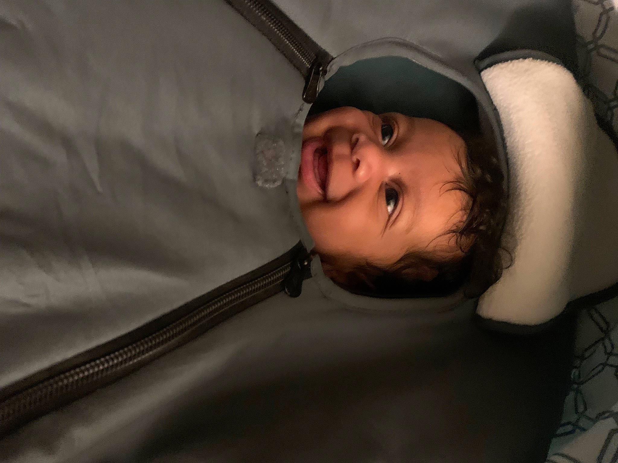 Kasmond is registered to the contest to win money with this photo: baby, chest, child, comfort, elbow, eye, eyelash, fashion_accessory, flash_photography, fun, happy, human_leg, laugh, linens, person, portrait_photography, room, smile, tints_and_shades, toddler