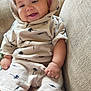 baby, child, smiling, hoodie, shorts, couch, indoor, happy, person, infant, clothing, fabric, cute, seat, portrait, skin, hand, face, comfort, cozy
