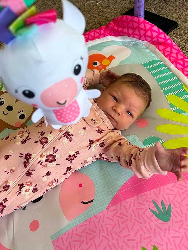 Carmen joined the competition — help win amazing prizes! baby, baby_products, baby_toddler_clothing, child, event, happy, linens, magenta, pattern, person, pink, play, plush, room, sleeve, smile, stuffed_toy, sweetness, textile, toddler
