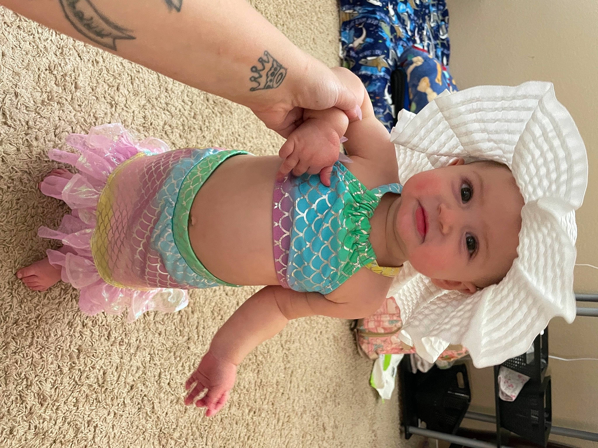 Dalilah joined the competition — help win amazing prizes! arm, baby, baby_toddler_clothing, child, dress, finger, hand, hat, headwear, human_body, joint, pattern, person, pink, skin, smile, textile, thigh, toddler, trunk