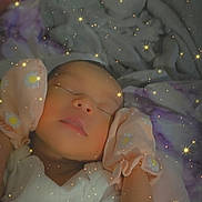 Olivia is registered to the contest to win money with this photo: baby, bed, bedroom, blanket, bodypart, bonnet, clothing, face, finger, furniture, hand, hat, head, indoors, newborn, person, photography, portrait, room, sleeping