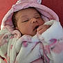 Olivia joined the competition — help win amazing prizes! baby, bed, blanket, bonnet, clothing, coat, face, furniture, glove, hat, head, hood, jacket, newborn, person, photography, portrait, quilt, sleeping, towel