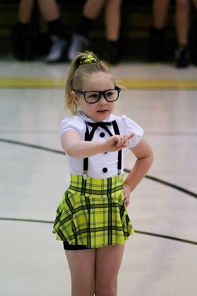 Abbigail joined the competition — help win amazing prizes! child, clothing, cosplay, costume, design, fashion, footwear, glasses, leg, pattern, performance, person, plaid, tartan, thigh, uniform, yellow