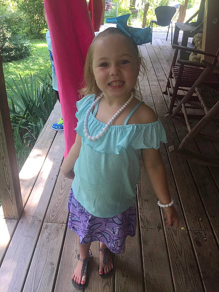 Abbigail is registered to the contest to win money with this photo: child, fun, head, joy, leisure, person, pink, plant, skin, smile, summer, toddler, tree, vacation