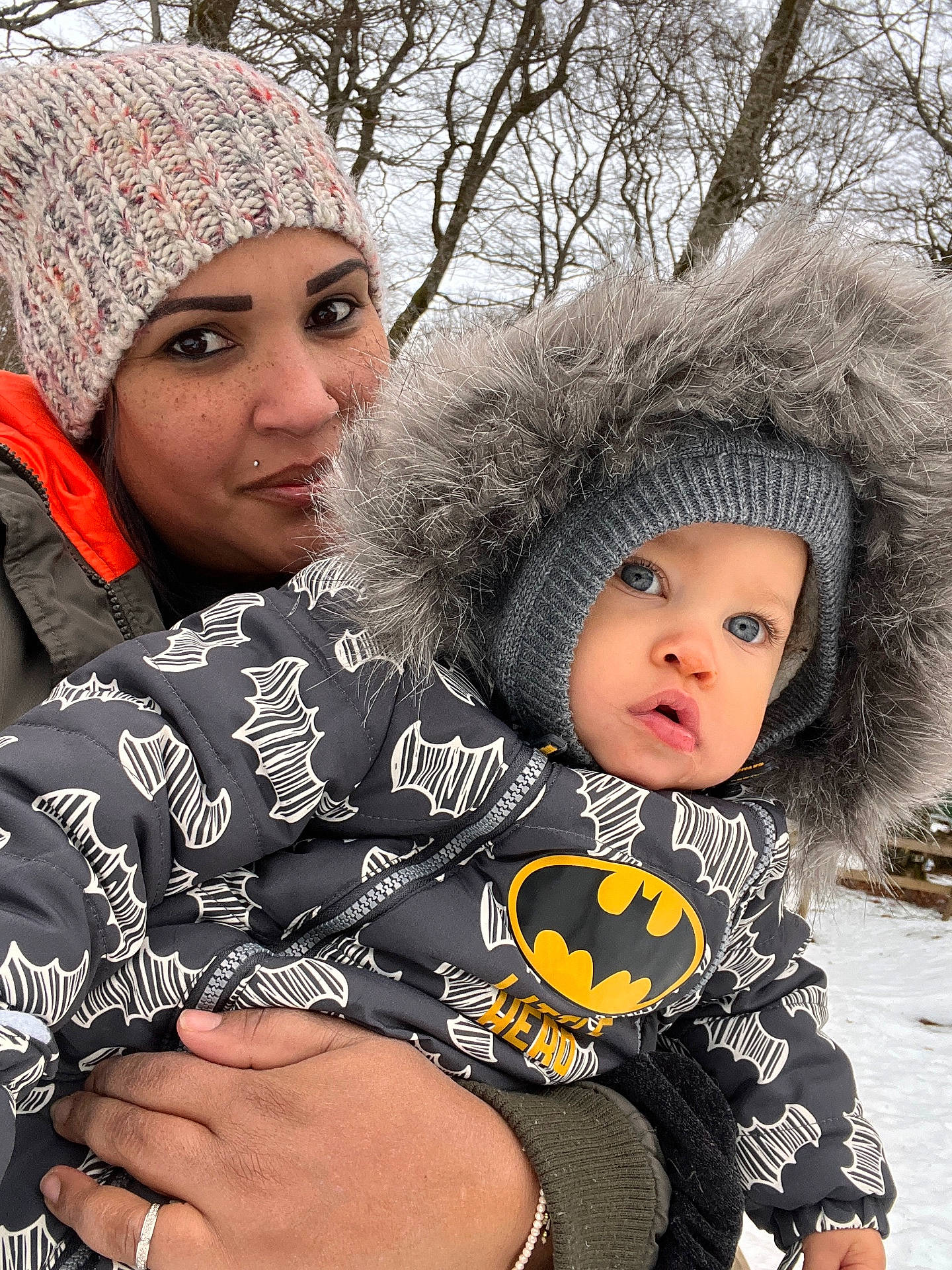 adult, baby, beanie, bodypart, bonnet, cap, clothing, coat, face, female, glove, hat, head, hood, knitwear, person, photography, portrait, sweater, woman