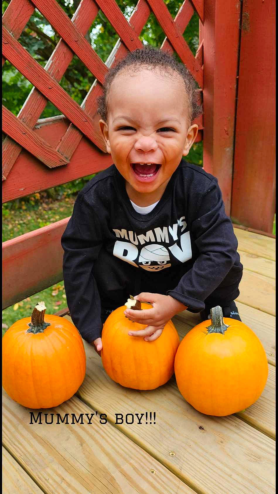 Torian is registered to the contest to win money with this photo: calabaza, clothing, eye, face, gourd, happy, head, human_body, jeans, natural_foods, orange, people, person, photograph, plant, pumpkin, shorts, smile, squash, vegetable