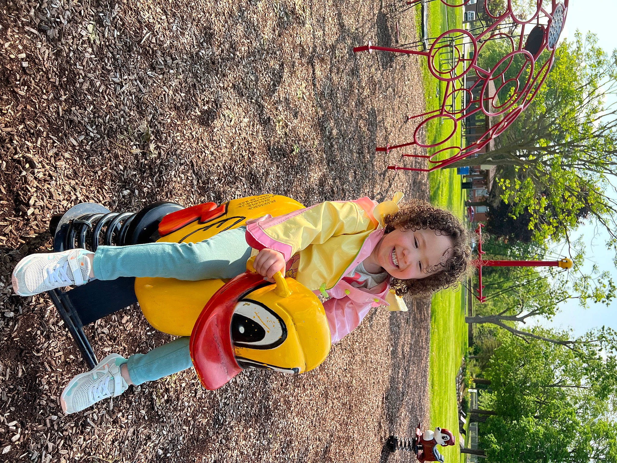 Arya is registered to the contest to win money with this photo: child, fun, grass, happy, joy, leisure, people, people_in_nature, person, plant, pole, recreation, sky, smile, toddler, tree