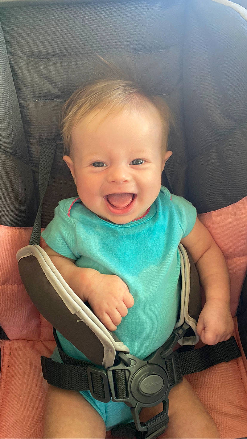 Ella Jane is registered to the contest to win money with this photo: arm, azure, chair, cheek, chin, comfort, eyebrow, facial_expression, hand, human, joint, leg, mouth, nose, organ, person, product, seat_belt, shoulder, skin