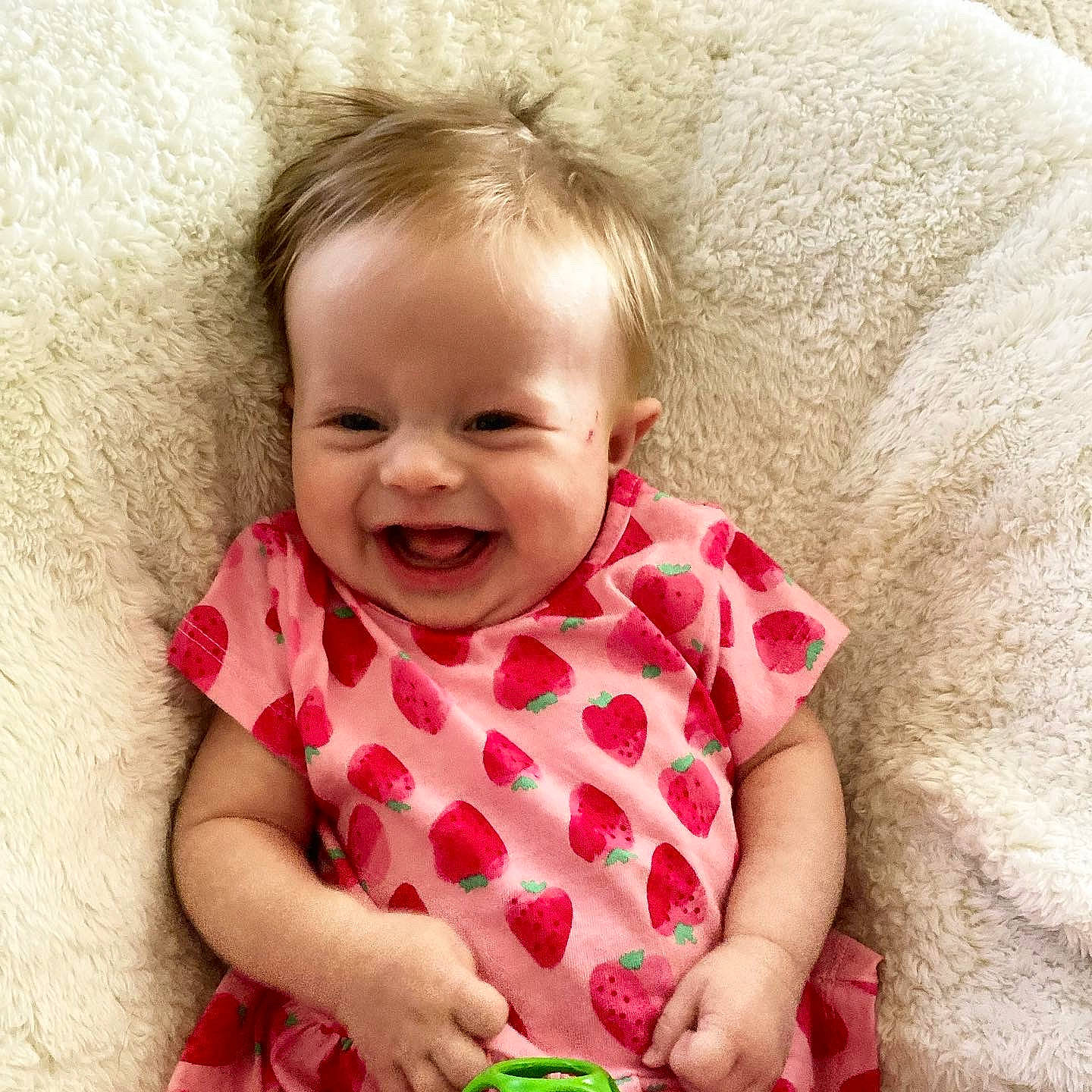 Ella Jane is registered to the contest to win money with this photo: arm, baby, baby_toddler_clothing, cheek, clothing, eye, face, gesture, hand, happy, head, iris, joy, lip, mouth, neck, nose, person, skin, sleeve