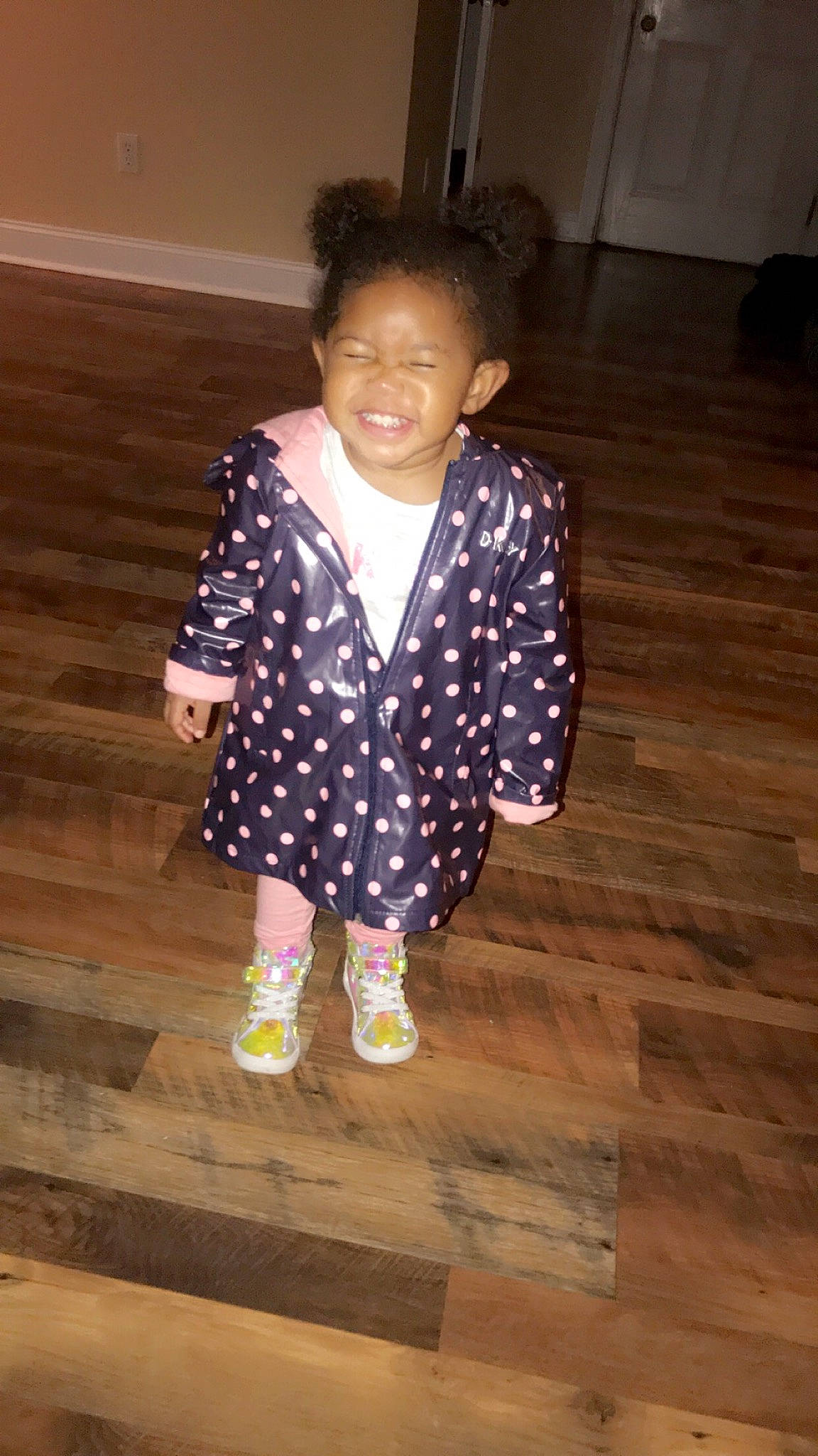 Ahzaria is registered to the contest to win money with this photo: child, design, flooring, joy, outerwear, pattern, person, polka_dot, toddler