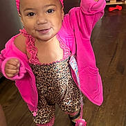 Kassandra joined the competition — help win amazing prizes! toddler, child, indoor, pink_jacket, leopard_print, headband, pacifier, smiling, happy, floor, shoes, person, clothing, cute, baby, small_child, standing, hand_raised, wooden_floor, footwear