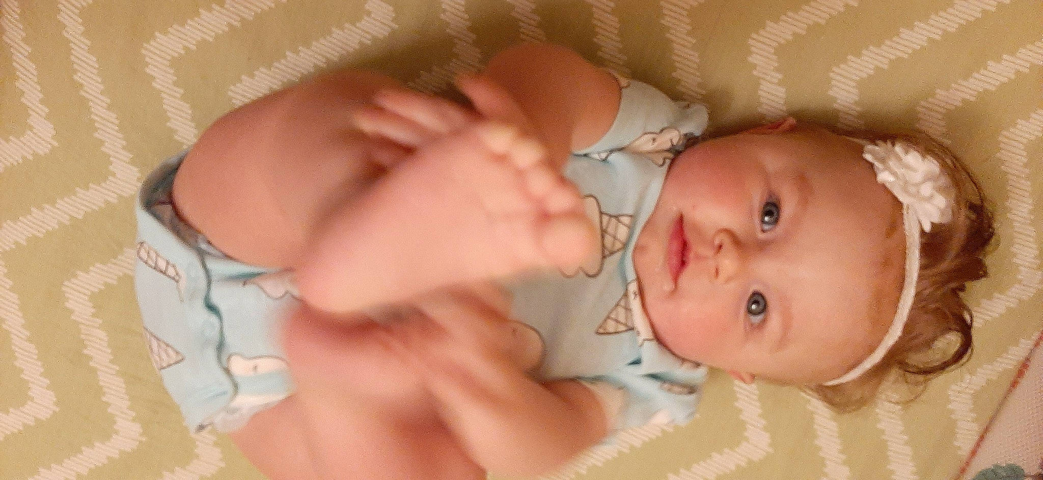 Ava is registered to the contest to win money with this photo: baby, cheek, child, chin, close_up, ear, eye, face, finger, hand, head, lip, mouth, muscle, nose, organ, person, pink, product, skin