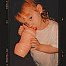 Ruthie Kay joined the competition — help win amazing prizes! baby, bottle, child, curly_hair, cute, drink, drinking, expression, face, hand, head, indoor, person, pink, portrait, skin, toddler, vintage, white_shirt, young_child