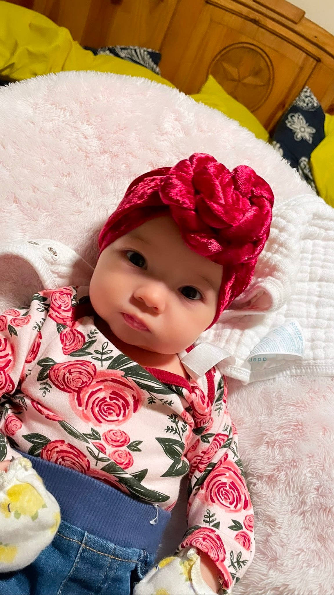 Ava is registered to the contest to win money with this photo: baby, baby_toddler_clothing, cap, cheek, child, dress, face, fashion_accessory, headwear, lip, magenta, outerwear, pattern, person, pink, plaid, sitting, skin, sleeve, tableware