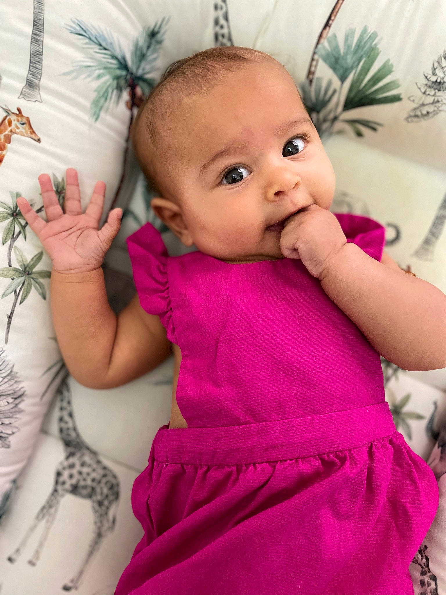 Charlie participe au concours pour gagner de l'argent avec cette photo : arm, baby, baby_toddler_clothing, cheek, eyebrow, eyelash, facial_expression, finger, gesture, hairstyle, happy, iris, lip, nose, person, pink, product, skin, sleeve, standing