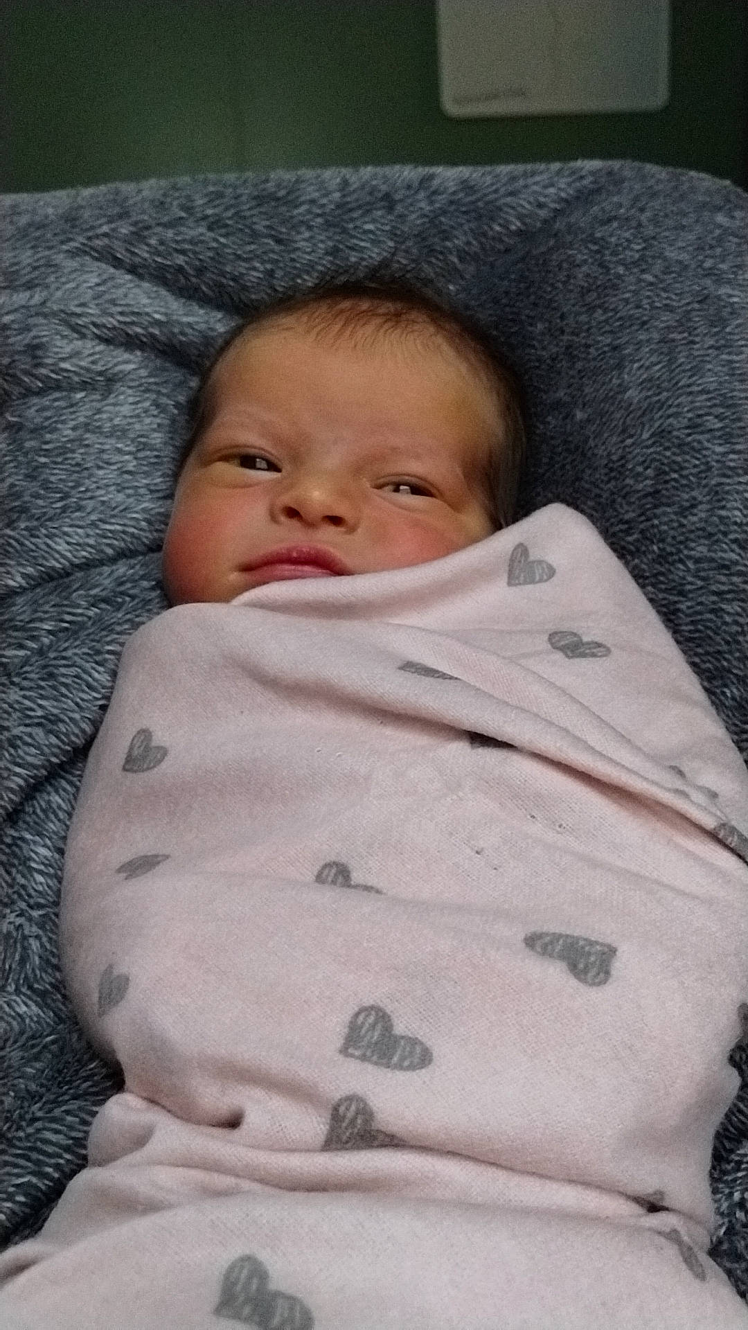 Paisley joined the competition — help win amazing prizes! baby, baby_toddler_clothing, cheek, child, chin, comfort, face, facial_expression, linens, nose, person, room, skin, sleeve, smile, textile, toddler