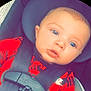 baby, car_seat, child, infant, seatbelt, red_clothing, nike, face, blue_eyes, close_up, safety, young_child, portrait, cute, straps, head_support, car_interior, expression, looking, casual