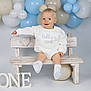 Oakley joined the competition — help win amazing prizes! baby, balloons, bench, birthday, celebration, child, cute, decorations, first_birthday, happy, infant, one, pastel_colors, portrait, sitting, smile, socks, studio, white_clothing, wood
