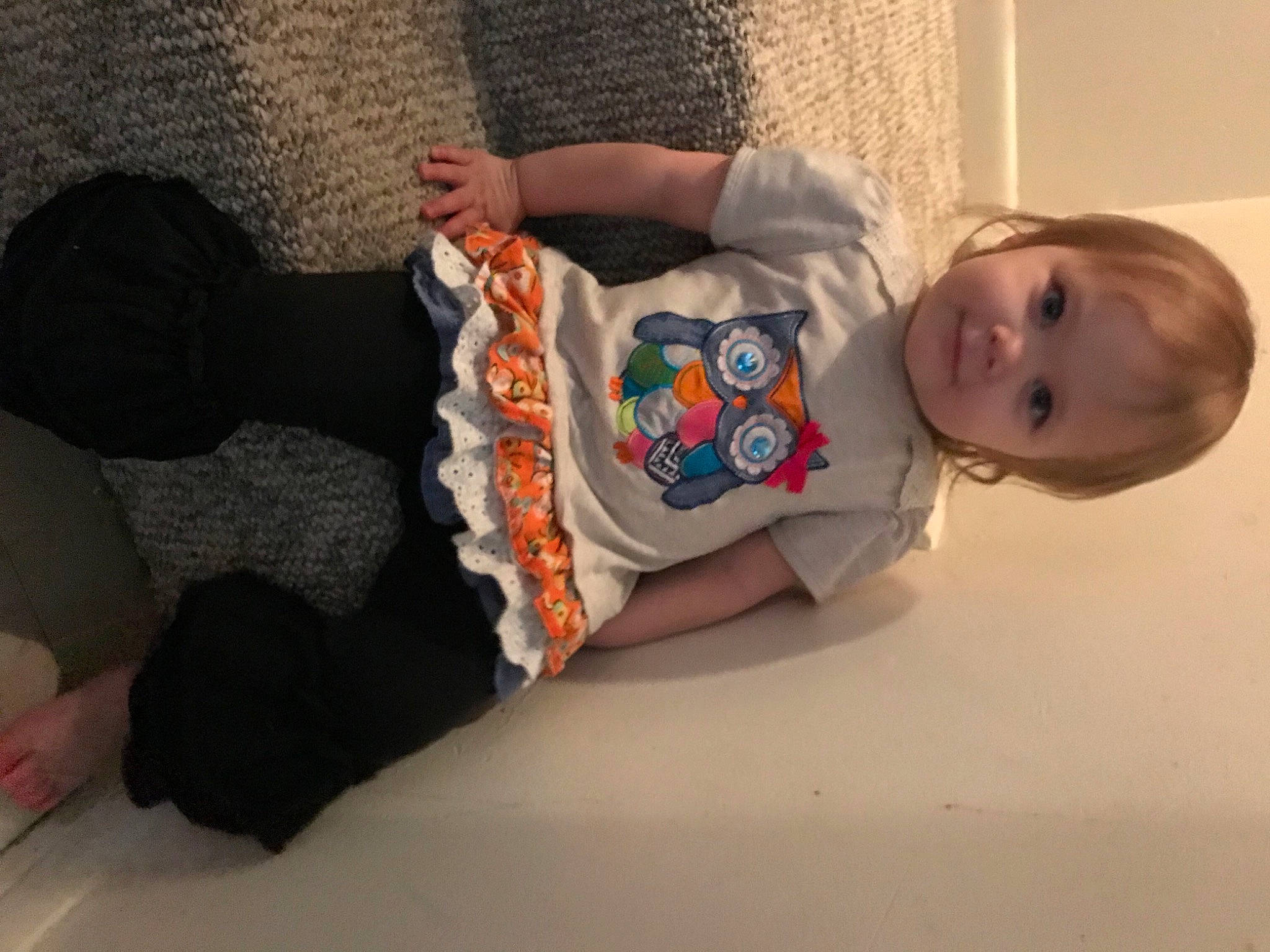 Gracelynn is registered to the contest to win money with this photo: abdomen, baby, baby_products, baby_toddler_clothing, child, comfort, eye, flooring, fun, human_body, human_leg, linens, pattern, person, sitting, skin, sleeve, smile, toddler, trunk