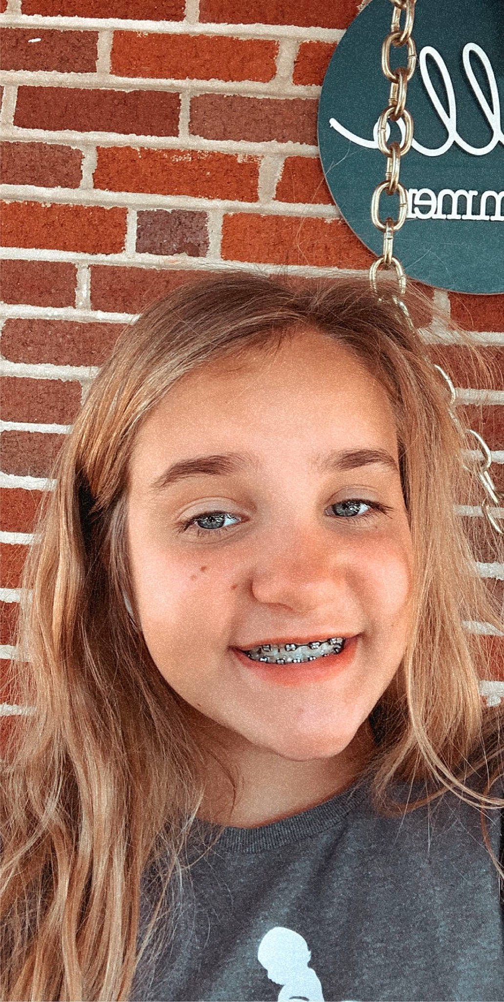 Sydney is registered to the contest to win money with this photo: blond, brown_hair, cheek, chin, eyebrow, face, facial_expression, forehead, hair, hairstyle, head, jaw, joy, lip, long_hair, mouth, nose, organ, person, skin