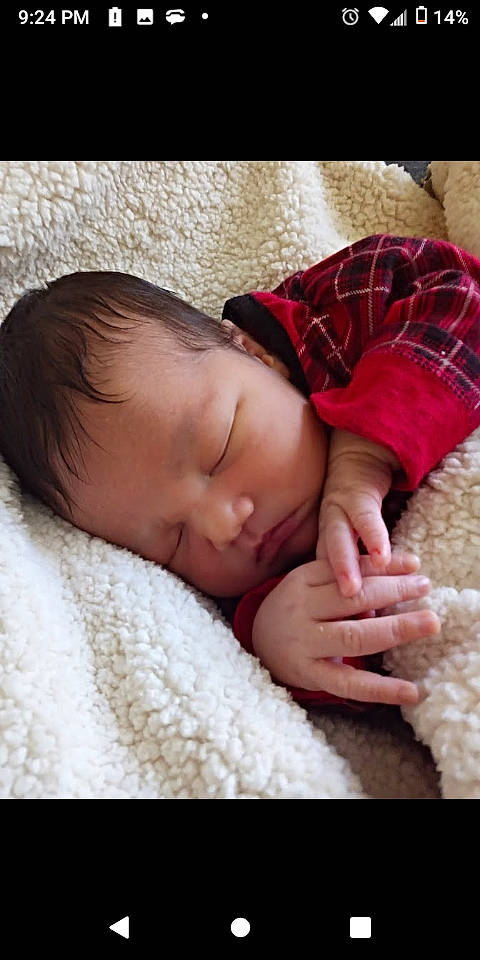 Octavia is registered to the contest to win money with this photo: baby, baby_sleeping, baby_toddler_clothing, bedding, bedtime, cheek, child, close_up, comfort, eyelash, fur, linens, lip, nap, nose, pattern, person, skin, sleeve, tartan
