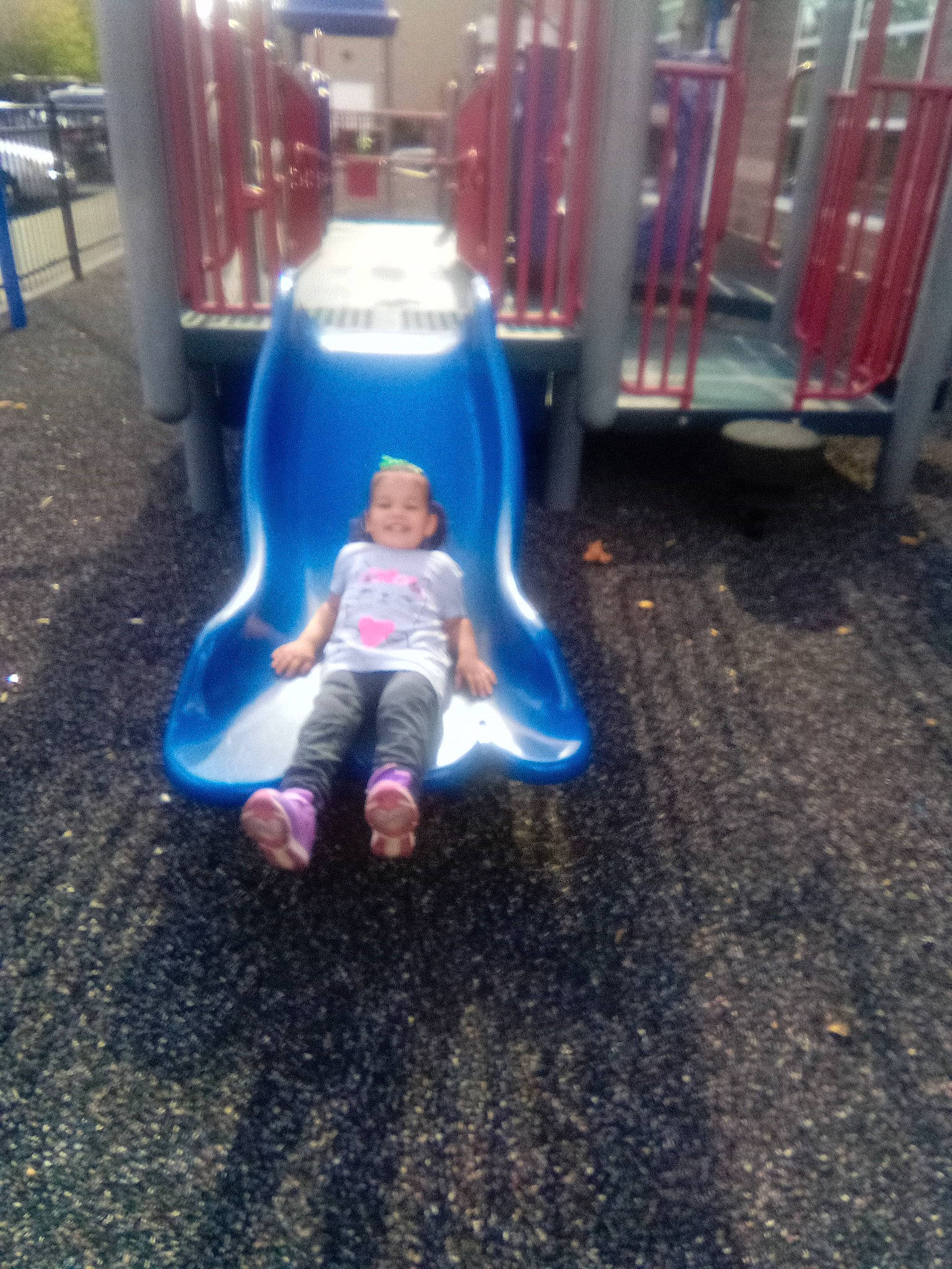 Belica Rivera Pacheco is registered to the contest to win money with this photo: asphalt, baby, chute, city, electric_blue, flooring, fun, games, joy, leisure, outdoor_play_equipment, outdoor_recreation, person, physical_fitness, plastic, play, playground, playground_slide, recreation, sitting