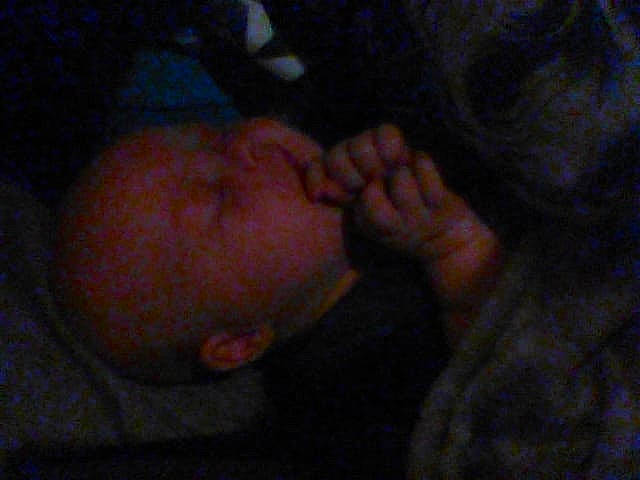 Danny is registered to the contest to win money with this photo: baby, chest, comfort, darkness, ear, elbow, finger, flesh, foot, gesture, human_body, human_leg, jaw, knee, nail, neck, nose, person, thumb, toddler