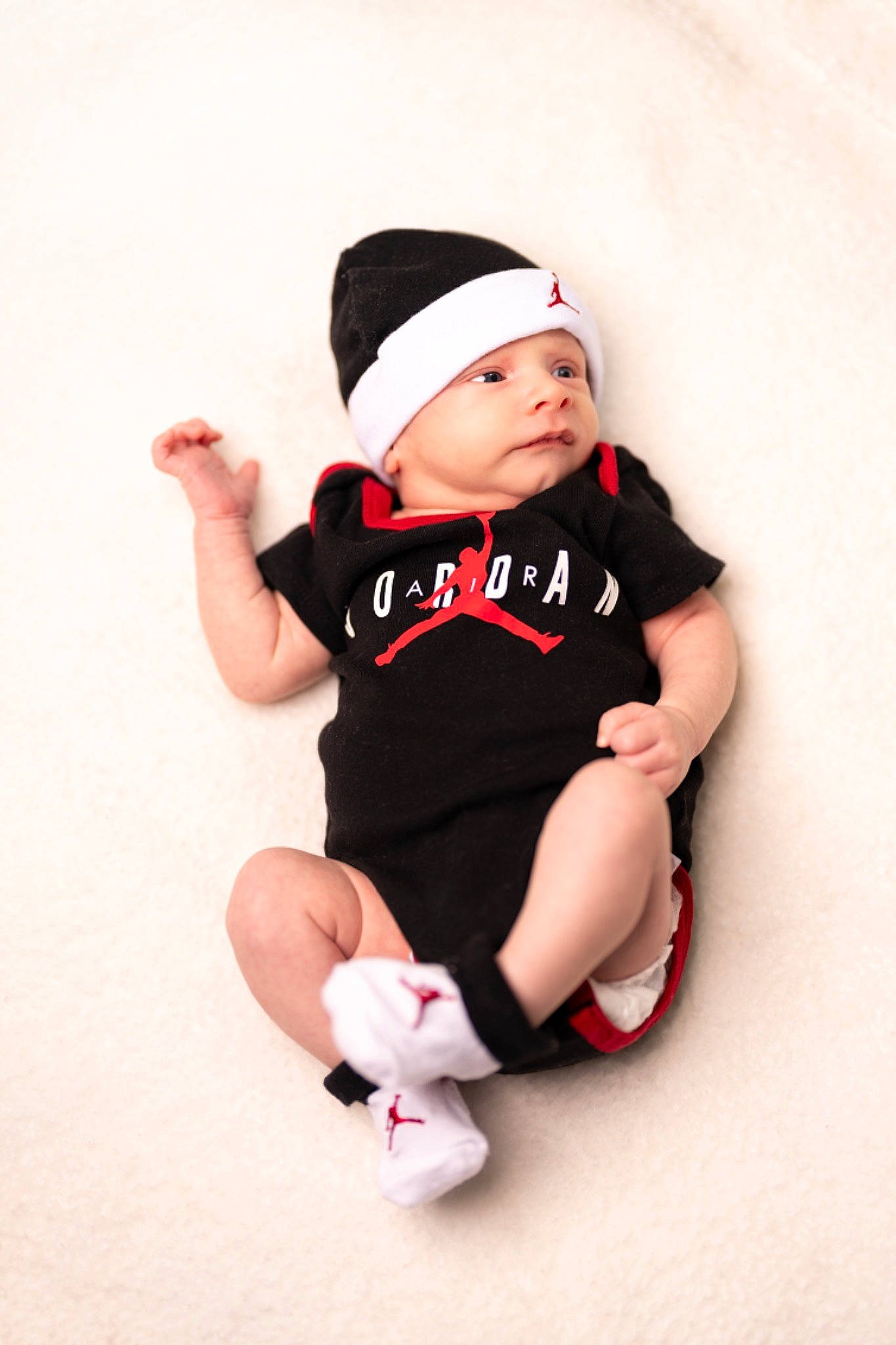 Aaron joined the competition — help win amazing prizes! baby, baby_toddler_clothing, cap, christmas, costume, costume_hat, elbow, fictional_character, flash_photography, happy, hat, headwear, holiday, human_body, human_leg, knee, person, sleeve, sock, t_shirt