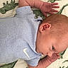 Austin joined the competition — help win amazing prizes! baby, infant, onesie, blue_clothing, dinosaur_blanket, blanket, laying_down, baby_arm, baby_hand, baby_face, newborn, cute, soft_lighting, child, sleepwear, patterned_blanket, infant_pose, baby_skin, resting, indoor