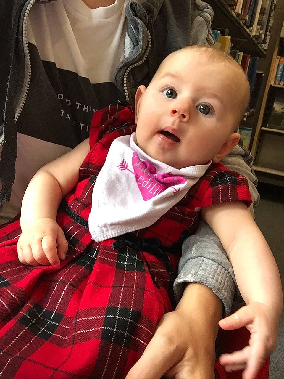 Skylar Rose is registered to the contest to win money with this photo: baby, baby_products, cheek, child, daughter, design, eye, leg, lip, pattern, person, plaid, product, sitting, skin, surprise, tartan, textile, toddler