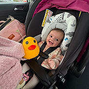 Alannah Carol is registered to the contest to win money with this photo: baby, car_seat, child, smiling, toy, rubber_duck, blanket, car_interior, seatbelt, child_safety, window, autumn, pink, clothing, head_support, happy, infant, portrait, cute, indoor