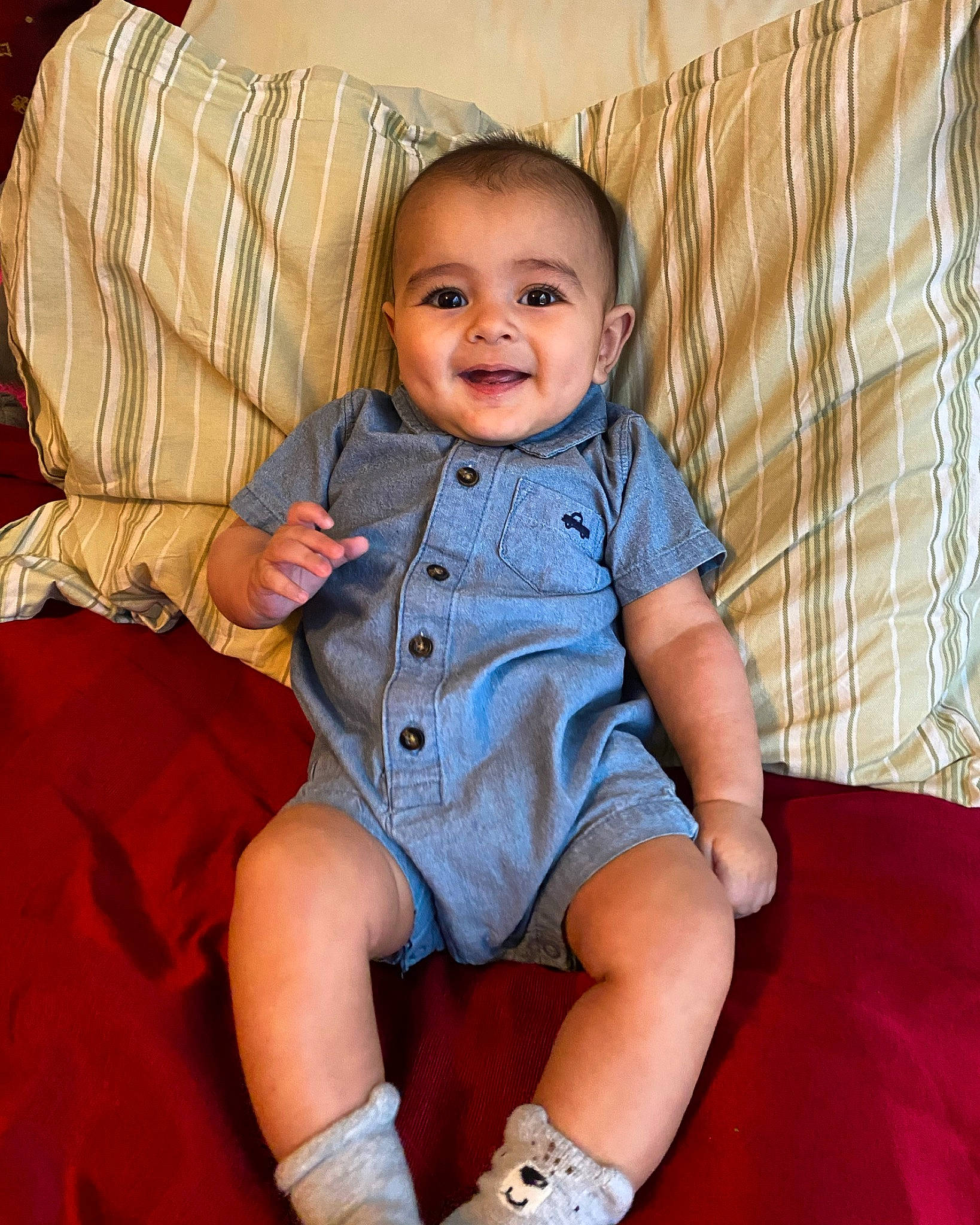 Thomas is registered to the contest to win money with this photo: abdomen, baby_toddler_clothing, cheek, child, comfort, electric_blue, fun, happy, head, human_leg, joy, knee, lap, leisure, pattern, person, sitting, skin, sleeve, smile
