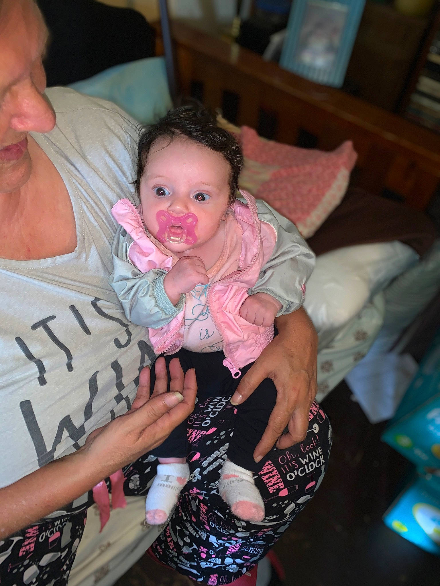 Journee is registered to the contest to win money with this photo: baby, baby_toddler_clothing, child, comfort, event, eye, face, facial_expression, finger, fun, hair, happy, iris, lap, leg, mouth, person, pink, skin, toddler