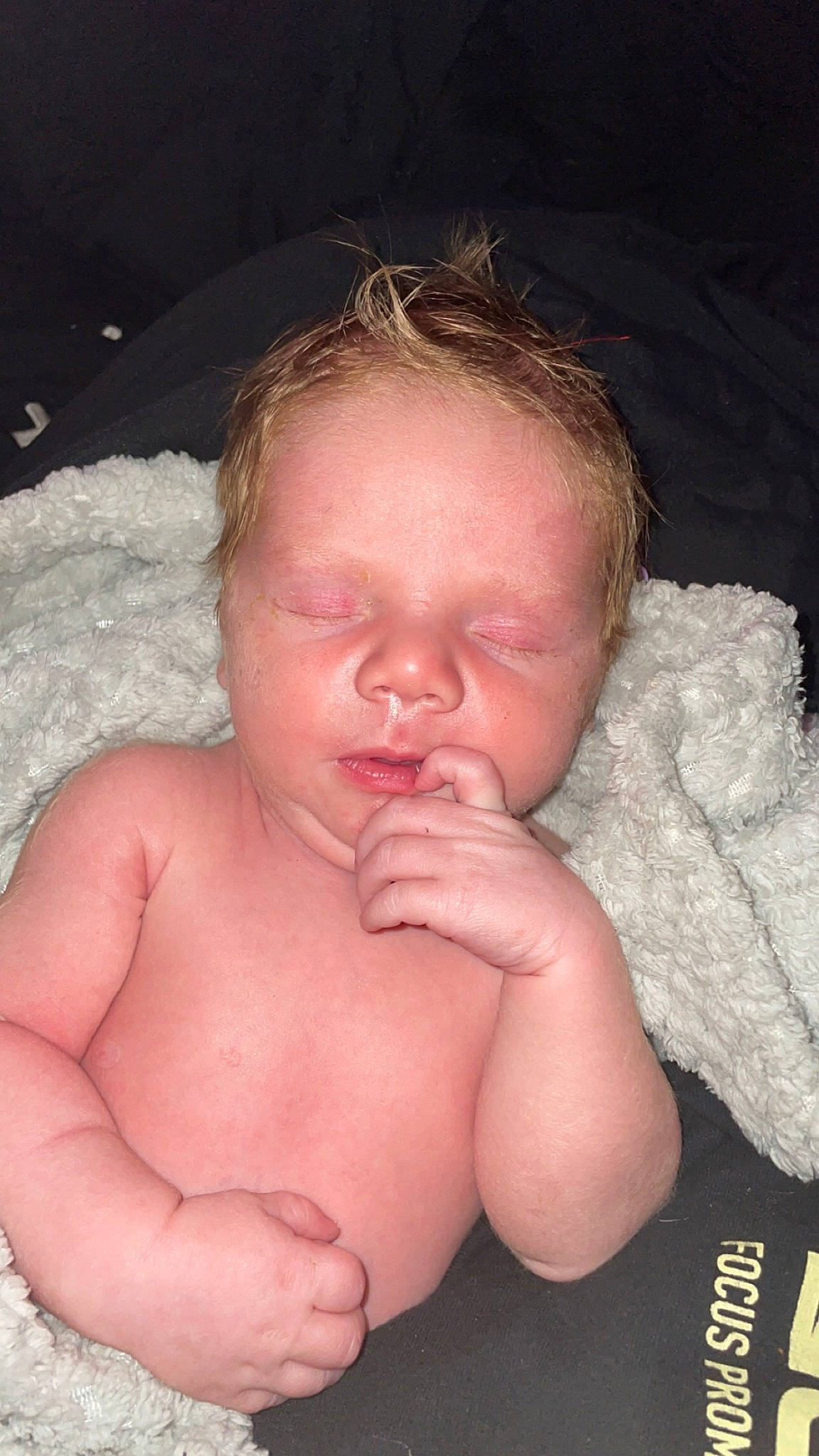 Calvin is registered to the contest to win money with this photo: arm, baby, cheek, chin, ear, eye, eyebrow, forehead, gesture, hair, hand, head, human_body, iris, lip, mouth, neck, nose, person, skin