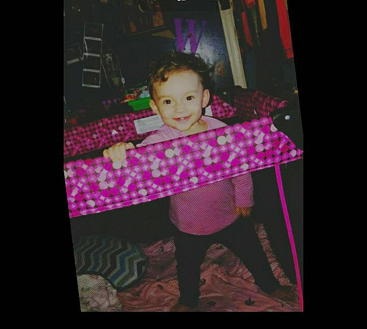 Sarah Gracelynn is registered to the contest to win money with this photo: art, baby, baby_toddler_clothing, display_device, font, joy, magenta, material_property, pattern, person, pink, purple, rectangle, room, sleeve, smile, square, t_shirt, tints_and_shades, toddler