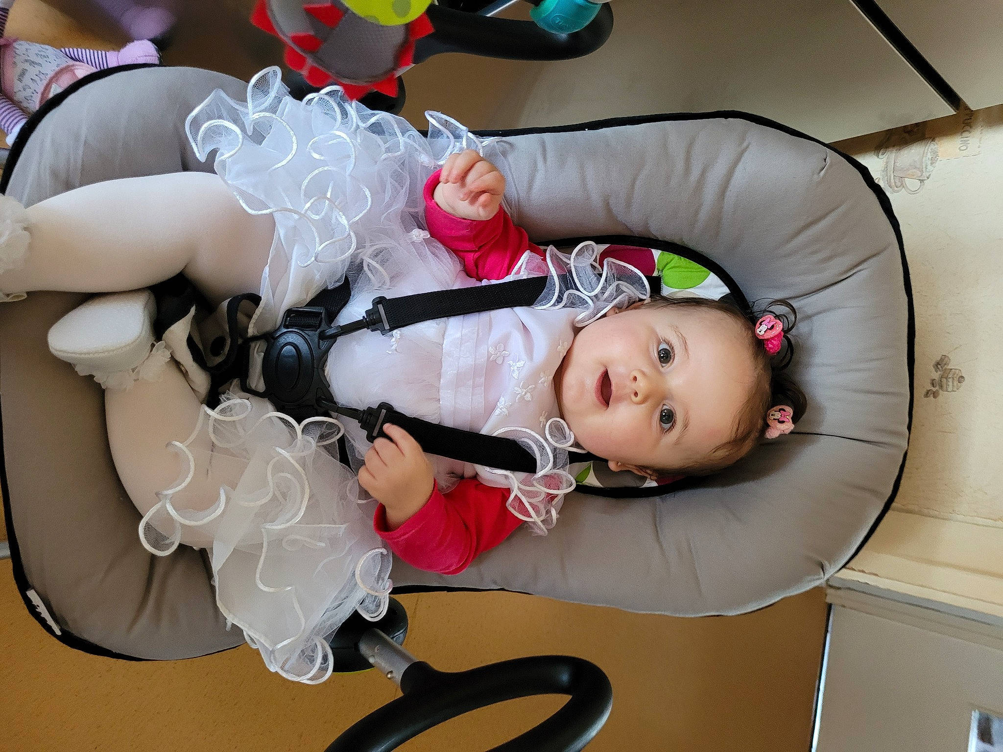 Kimberley participe au concours pour gagner de l'argent avec cette photo : baby, baby_products, baby_toddler_clothing, baby_toys, carmine, child, costume, dress, event, eye, fashion_accessory, fictional_character, happy, headpiece, person, pink, room, skin, smile, toddler