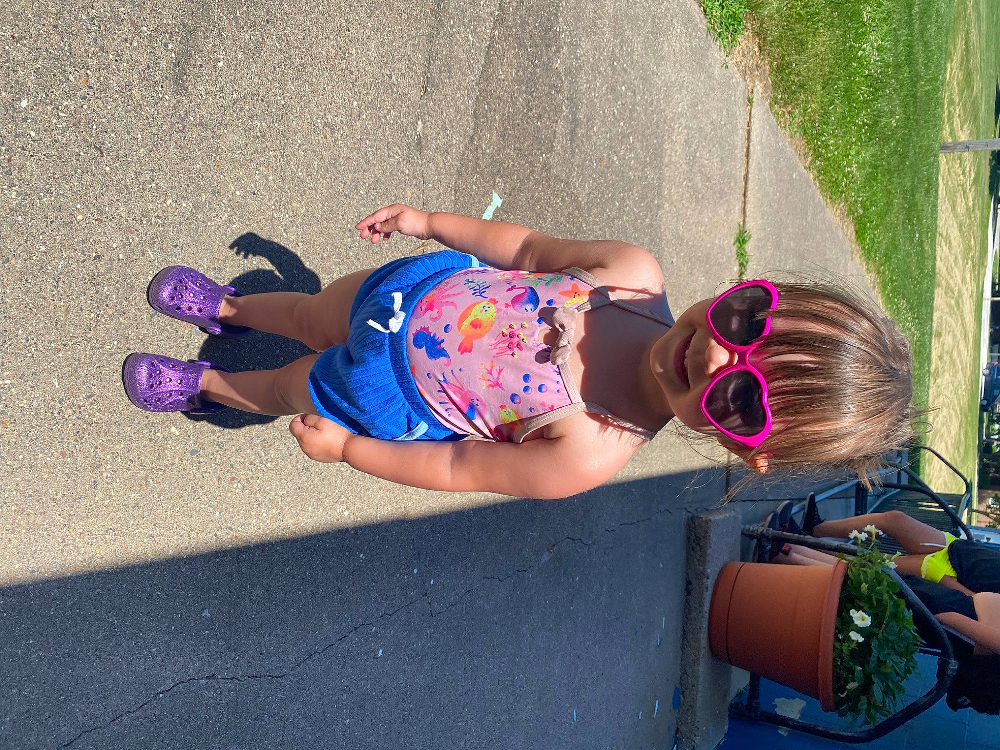 Aaliyah joined the competition — help win amazing prizes! asphalt, electric_blue, fun, glasses, helmet, human_leg, joint, joy, knee, leg, leisure, magenta, person, pink, purple, recreation, sidewalk, sunglasses, t_shirt, thigh