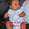 Dakylan is registered to the contest to win money with this photo: baby, infant, child, portrait, sitting, indoors, widened_eyes, curly_hair, blue_outfit, mittens, bare_feet, smiling, person, adult, couch, television, patrick_star, cartoon, fourth_of_july, text_overlay