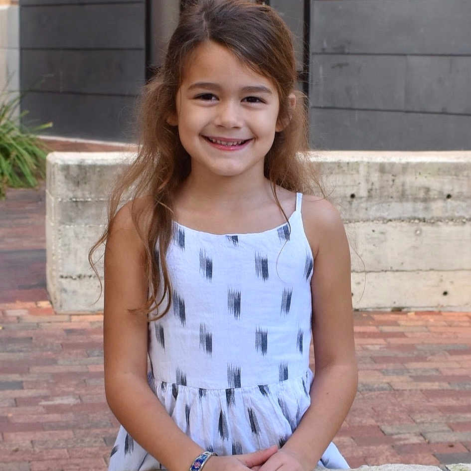 Makenzie Leann is registered to the contest to win money with this photo: child, child_model, design, dress, joy, pattern, person, photo_shoot, photograph, photography, sitting, smile, toddler