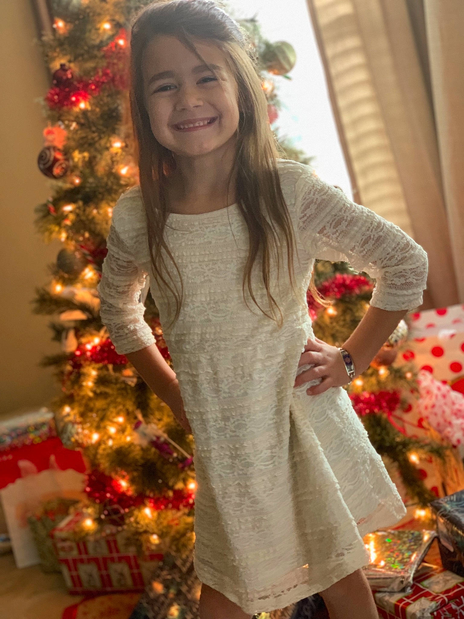 Makenzie Leann joined the competition — help win amazing prizes! christmas, christmas_decoration, christmas_eve, christmas_ornament, christmas_tree, event, happy, holiday, interior_design, joy, long_hair, outerwear, person, smile, tree