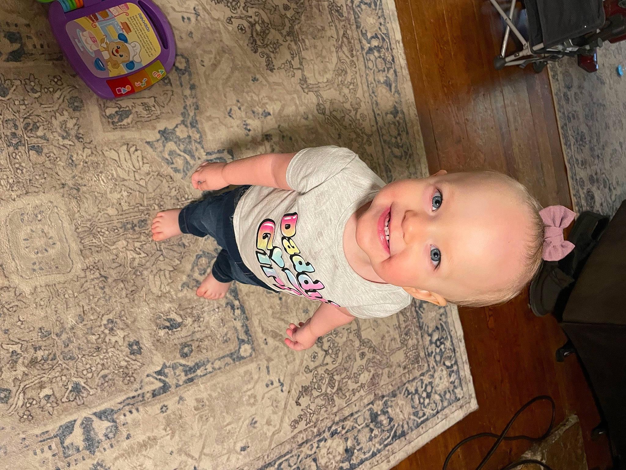 Brinley joined the competition — help win amazing prizes! baby, baby_toddler_clothing, cheek, child, eye, finger, floor, flooring, fun, hair, happy, hardwood, human_body, joy, leg, mouth, pattern, person, skin, smile