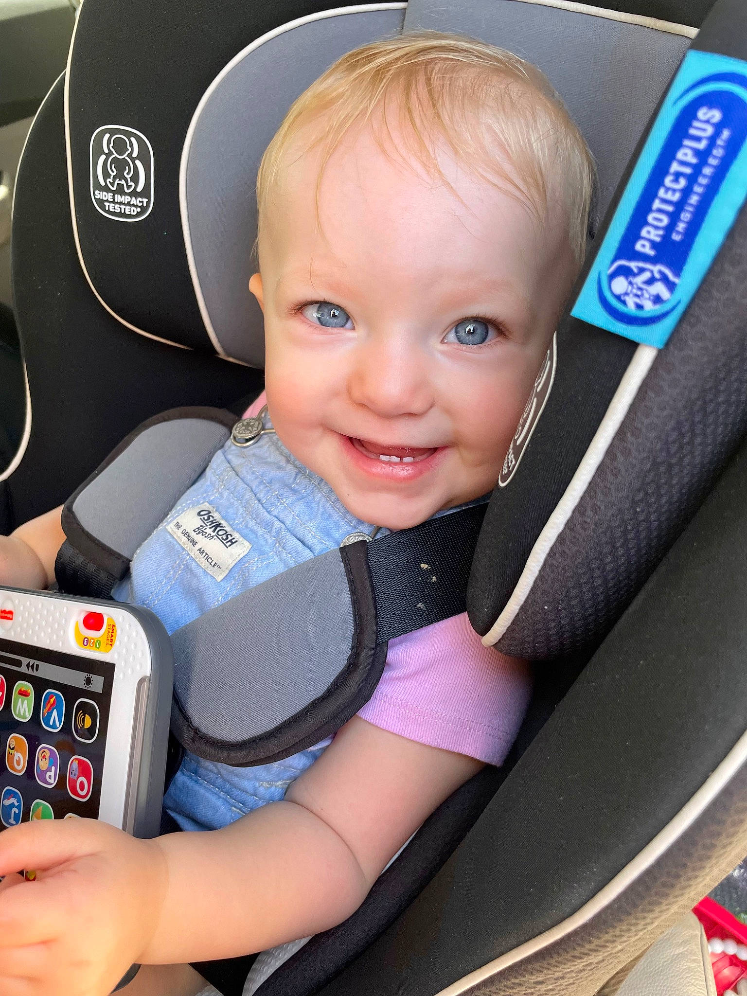 Brinley joined the competition — help win amazing prizes! auto_part, automotive_design, automotive_wheel_system, baby, baby_carriage, baby_products, car_seat, child, communication_device, electric_blue, fun, joy, machine, motor_vehicle, person, portable_communications_device, product, smile, steering_wheel, telephony
